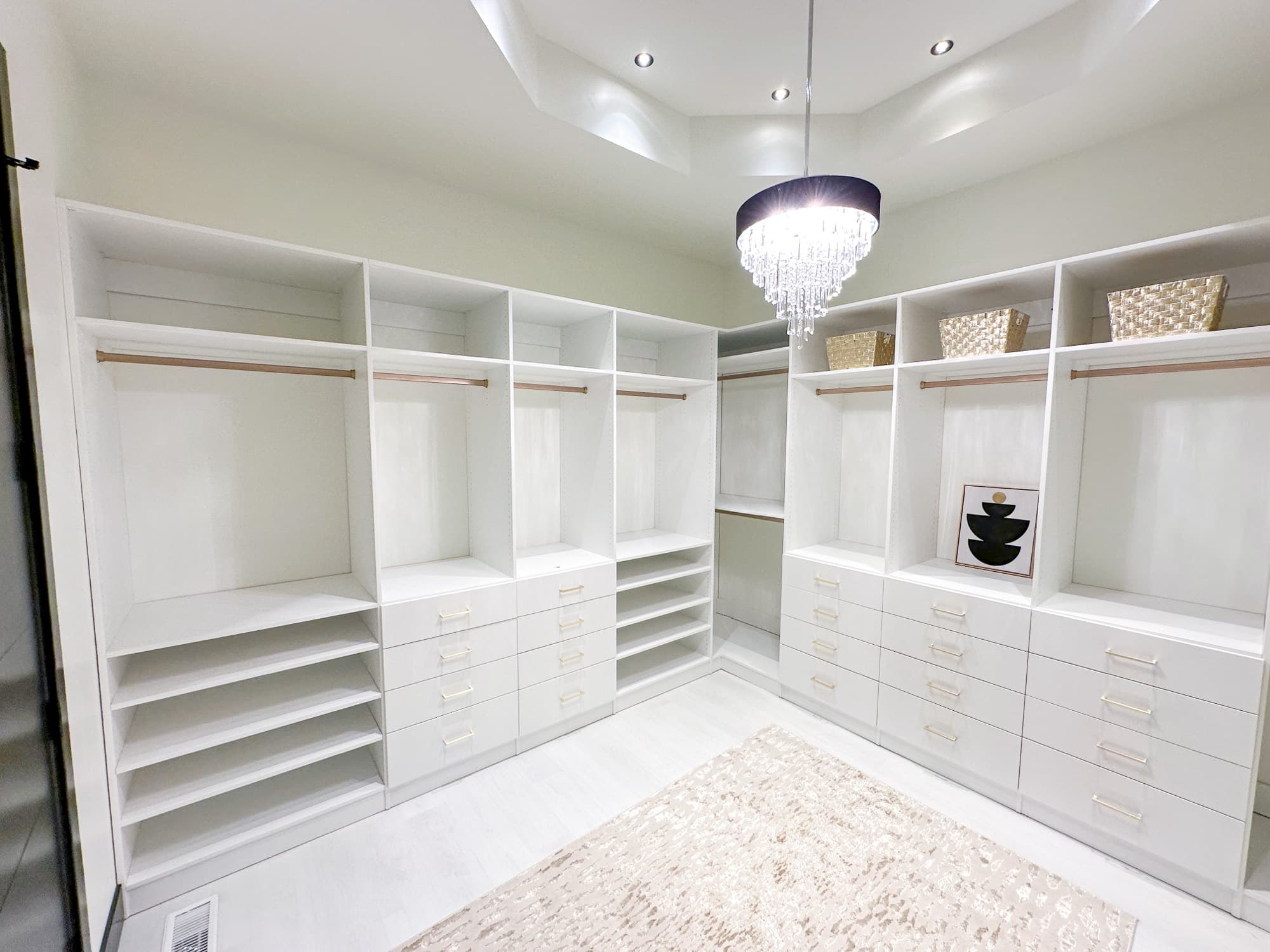 Walk-in closet with center island and marble top