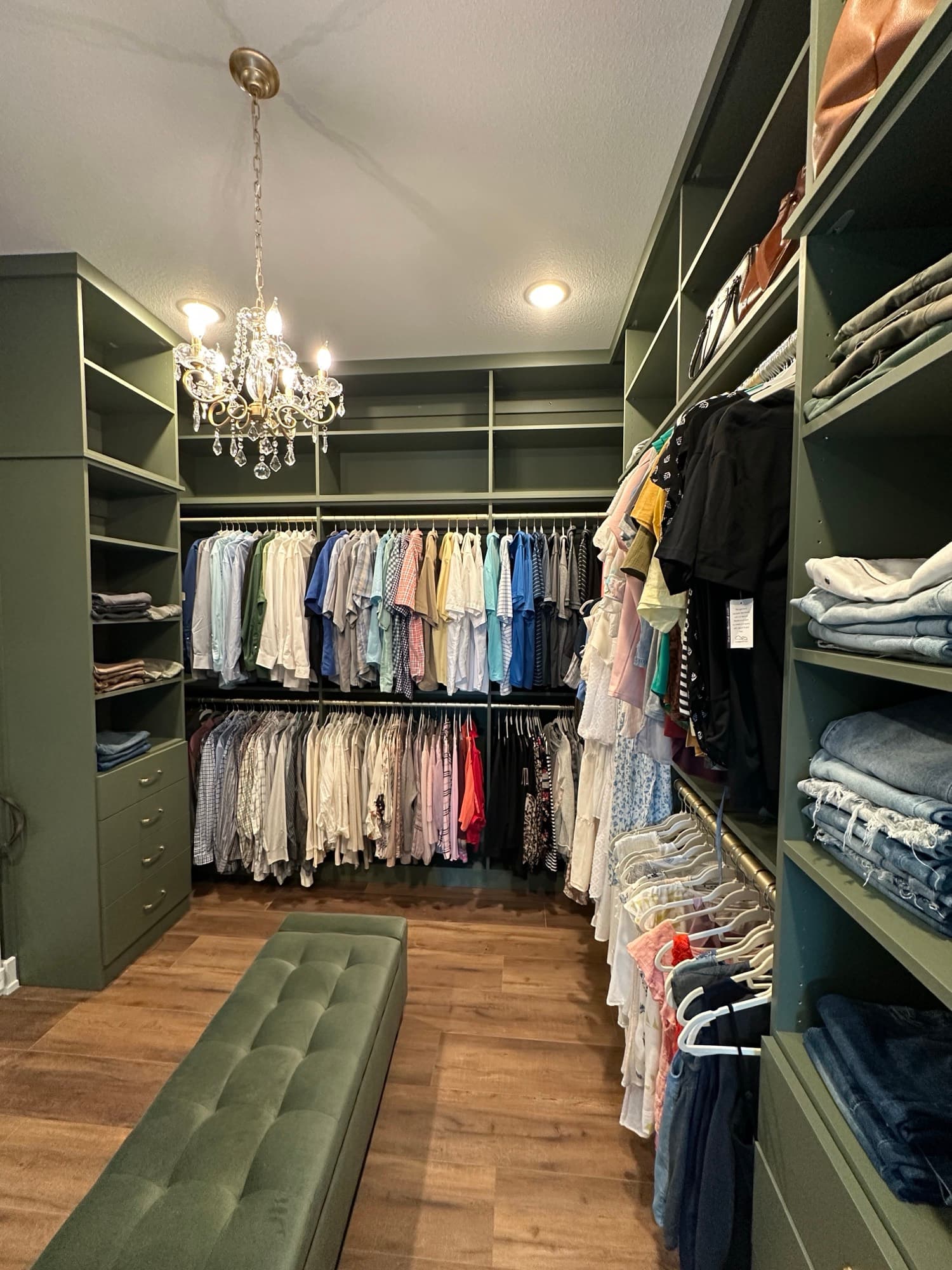 Custom walk-in closet with built-in drawers and shelving